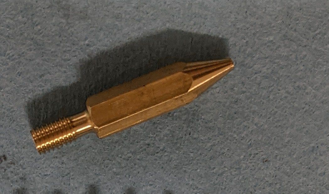 A close up of the tip of a bullet